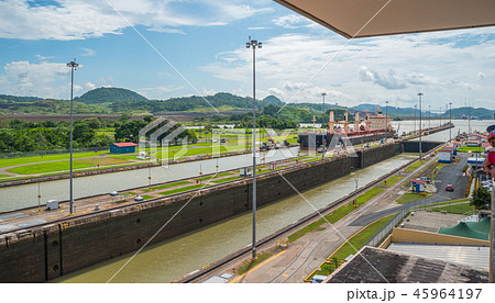 Cargo ship in lift locks of the Panama Canal. Cargo ship in lift locks of the Panama Canal. 45964197