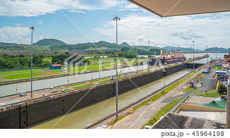 Cargo ship in lift locks of the Panama Canal. Cargo ship in lift locks of the Panama Canal. 45964198