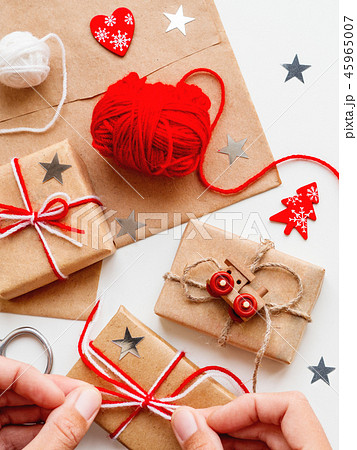 Christmas and New Year DIY presents in craft paper Christmas and New Year DIY presents in craft paper 45965007