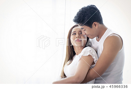 Portrait of sweet couple hugging and smile Portrait of sweet couple hugging and smile 45966336