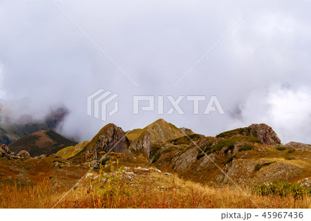 rocky cloudy mountain landscape rocky cloudy mountain landscape 45967436