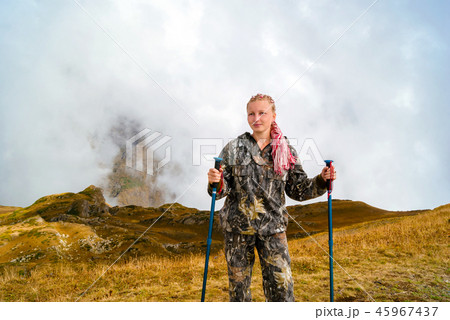 girl is engaged in trekking in the mountains 45967437