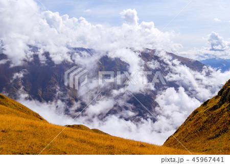 cloudy mountain valley 45967441