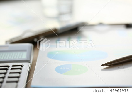 Silver calculator with gray keyboard is lying 45967938