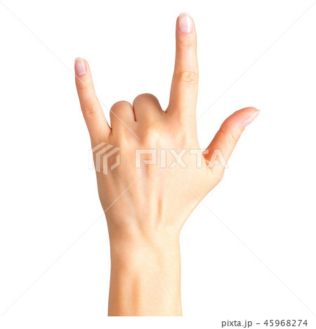 Female hand showing rock n roll sign or giving the devil horns gesture Female hand showing rock n roll sign or giving the devil horns gesture 45968274