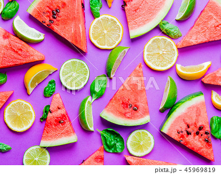 cutted lemons and limes with watermelon 45969819