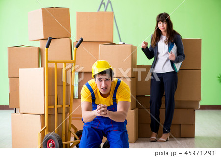 Woman boss and man contractor working with boxes delivery Woman boss and man contractor working with boxes delivery 45971291