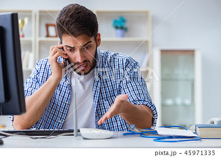 Frustrated young man due to weak internet reception 45971335