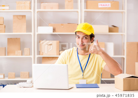 Handsome contractor working in box delivery relocation service  45971835