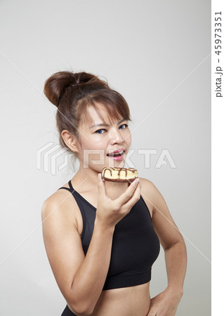 Beauty fashion Young woman holding donuts Beauty fashion Young woman holding donuts 45973351