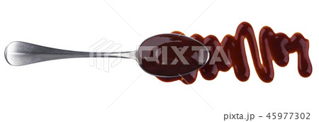 Barbecue sauce. Splashes and spilled grill sauce with spoon isolated on white background. Top view 45977302