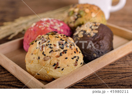 whole wheat multi-grains bread in wooden box 45980211