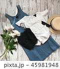 Women's clothes on the wooden background 45981948