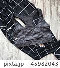 Sports top on a wooden background 45982043