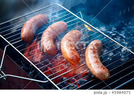 Tasty meat sausages in a natural shell are roasted 45984075