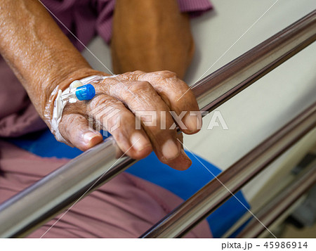 Close up hand patient elderly man hand with saline Close up hand patient elderly man hand with saline 45986914