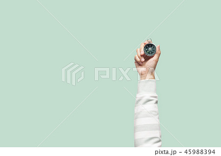 Woman holding compass 45988394