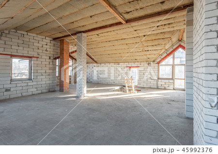 attic floor of the house. overhaul and reconstruction. Working process of warming inside part of attic floor of the house. overhaul and reconstruction. Working process of warming inside part of 45992376