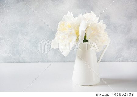Beautiful bouquet of white peony flowers in vase. Beautiful bouquet of white peony flowers in vase. 45992708