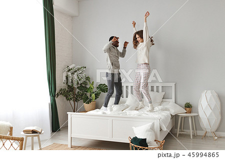 happy couple in love on winter morning in bed. 45994865