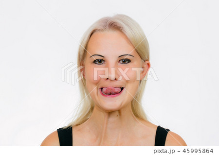 Face exercise for women touch your nose 45995864