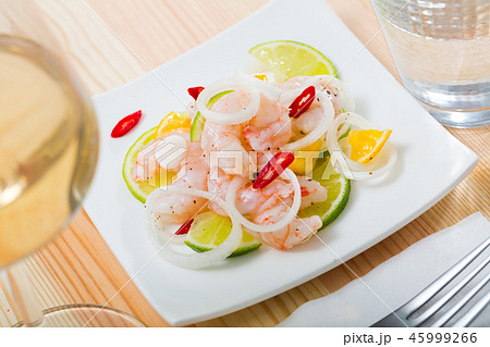 Ceviche with shrimps, lime, tangerine and hot pepper Ceviche with shrimps, lime, tangerine and hot pepper 45999266