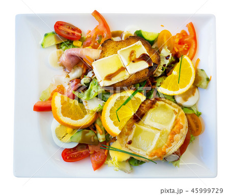 Salad with goat cheese, greens, vegetables 45999729