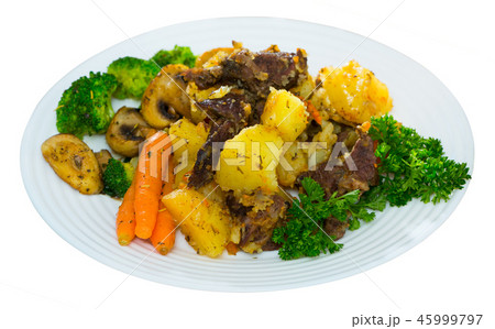 Stew of beef with potatoes, mushrooms and vegetables Stew of beef with potatoes, mushrooms and vegetables 45999797