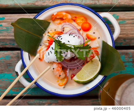 Top view of ceviche in Vietnamese style with coconut milk Top view of ceviche in Vietnamese style with coconut milk 46000405