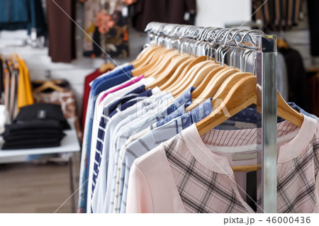 Fashion clothes on hangers and shelfs Fashion clothes on hangers and shelfs 46000436