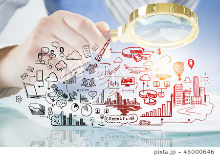 Businessperson examining business plan Businessperson examining business plan 46000646