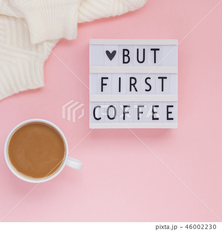 But first coffee text on lightbox with Coffee Cup 46002230