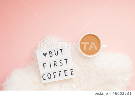 But first coffee text on lightbox with Coffee Cup 46002231