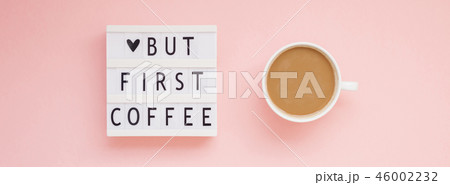 But first coffee text on lightbox with Coffee Cup 46002232