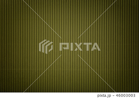 Texture of corrugated green paper with vignette 46003003