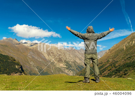 Hiker man walking mountains Hiker man walking mountains 46004096