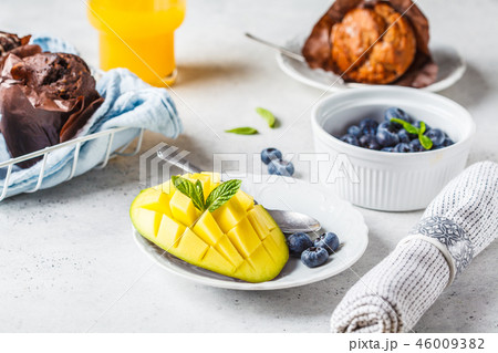 Breakfast served with muffins, juice, berries 46009382