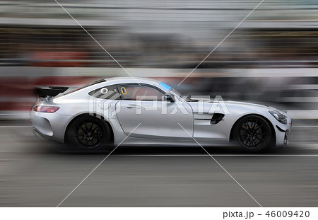 Race car racing on speed track 46009420