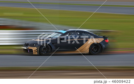 Racing car in motion 46009422