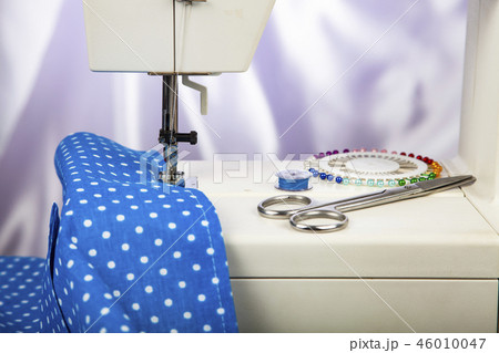 Sewing machine and blue fabric Sewing machine and blue fabric 46010047