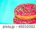 Bright tasty pink glazed donuts doughnuts on blue  46010382