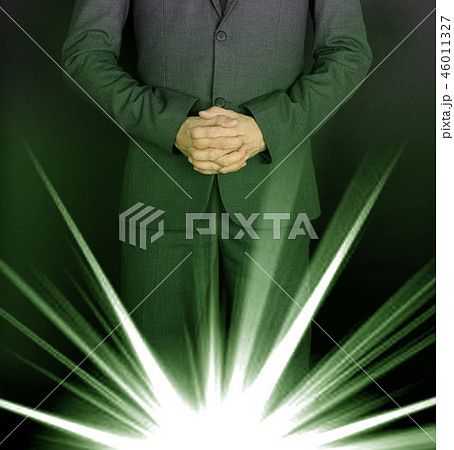 Hands crossed in prayer 46011327