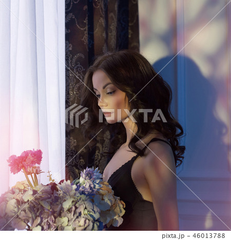 Sensual woman with flowers 46013788