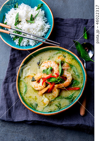 THAI SHRIMPS GREEN CURRY. Thailand tradition green curry soup with shrimps prawns and coconut milk THAI SHRIMPS GREEN CURRY. Thailand tradition green curry soup with shrimps prawns and coconut milk 46022317
