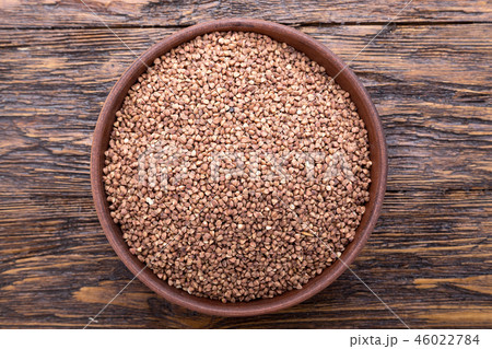 plate with raw buckwheat 46022784