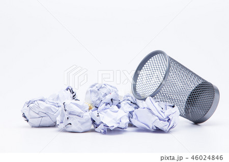 Crumpled Papers In Basket Over White Background 46024846