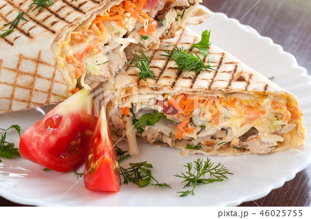 Fresh Shawarma grilled in a white dish Fresh Shawarma grilled in a white dish 46025755