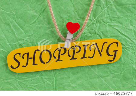 Close up yellow card with inscription shopping. Close up yellow card with inscription shopping. 46025777