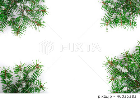 Christmas Frame of Fir tree branch with snow isolated on white background with copy space for your Christmas Frame of Fir tree branch with snow isolated on white background with copy space for your 46035383