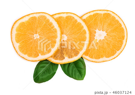 Slices of orange with leaves isolated on white background. Flat lay, top view. Fruit composition Slices of orange with leaves isolated on white background. Flat lay, top view. Fruit composition 46037124